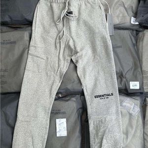Essentials track suit grey